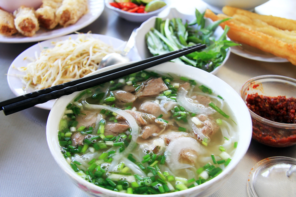 Tour gastronomique Vietnam : saveurs authentiques à Hanoï, Hoi An et Saïgon